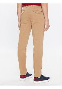 TOMMY HILFIGER - Tommy Hilfiger Spodnie materiałowe Hampton MW0MW32568 Beżowy Slim Fit. Kolor: beżowy. Materiał: bawełna