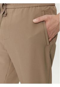 BOSS - Boss Spodnie dresowe T_Flex 50495491 Zielony Tapered Fit. Kolor: zielony. Materiał: syntetyk #4