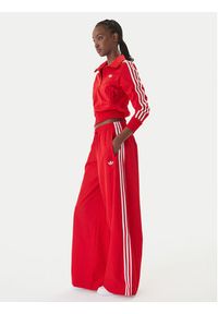 Adidas - adidas Spodnie dresowe Firebird Adilenium KD6299 Czerwony Regular Fit. Kolor: czerwony. Materiał: syntetyk #2