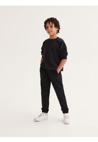 Reserved - Dresowe spodnie jogger - czarny. Kolor: czarny. Materiał: dresówka #1
