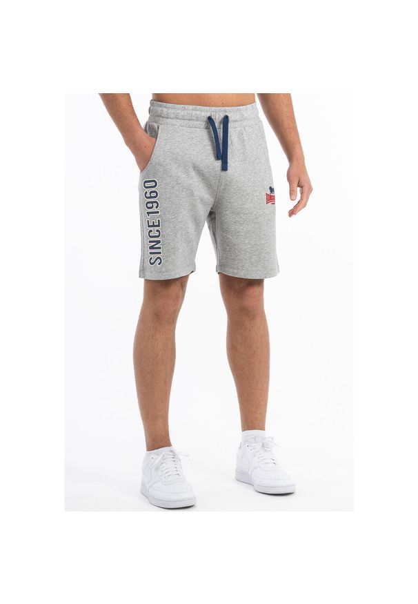 Krótka regularna fryzura Lonsdale Skaill. Kolor: wielokolorowy, niebieski, szary. Długość: krótkie. Sport: fitness