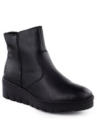 Skórzane botki damskie na koturnie czarne Rieker X9165-01. Kolor: czarny. Materiał: skóra. Obcas: na koturnie #1