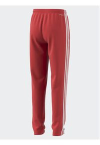 Adidas - adidas Spodnie dresowe Train Essentials AEROREADY 3-Stripes Regular-Fit Joggers IJ9549 Czerwony Regular Fit. Kolor: czerwony. Materiał: syntetyk