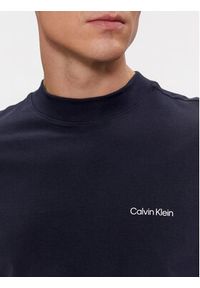 Calvin Klein Longsleeve Micro Logo K10K110179 Granatowy Regular Fit. Kolor: niebieski. Materiał: wełna. Długość rękawa: długi rękaw