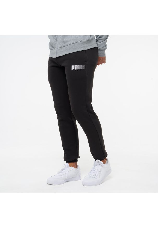 Decathlon - Spodnie fitness męskie Puma. Kolor: czarny. Materiał: bawełna, materiał, dresówka. Sport: fitness