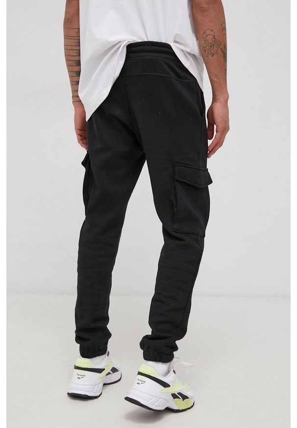 Jack & Jones Spodnie męskie kolor czarny gładkie. Kolor: czarny. Wzór: gładki