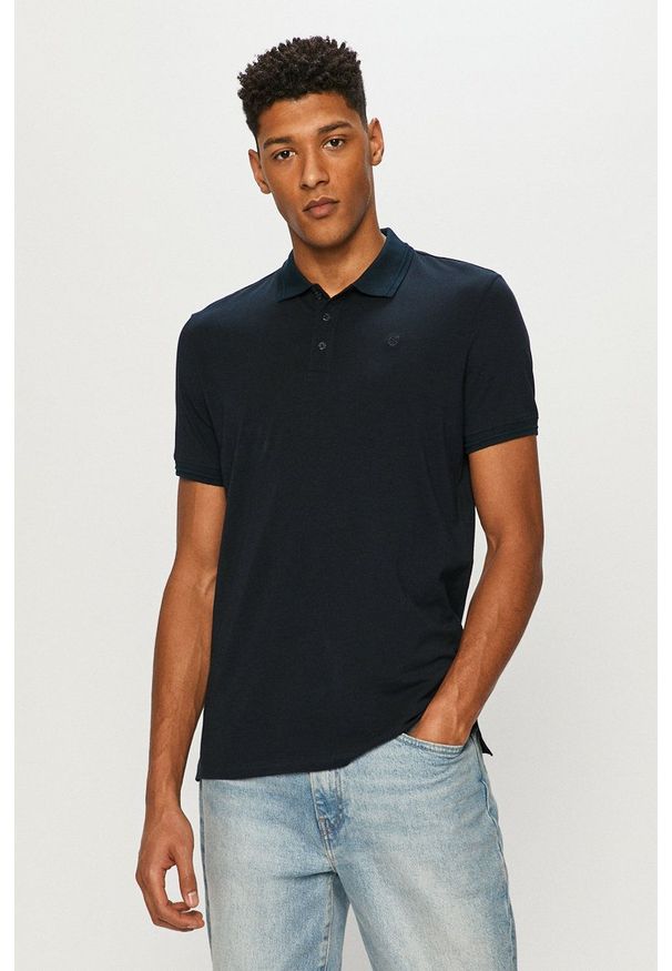 Premium by Jack&Jones - Polo. Okazja: na co dzień. Typ kołnierza: polo. Kolor: niebieski. Materiał: dzianina. Długość: krótkie. Wzór: gładki. Styl: casual