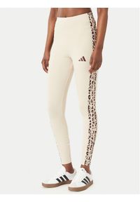 Adidas - adidas Legginsy Seasonal Essentials Animal Print 3-Stripes KR7619 Beżowy jasny Slim Fit. Kolor: beżowy. Materiał: bawełna. Wzór: nadruk #1