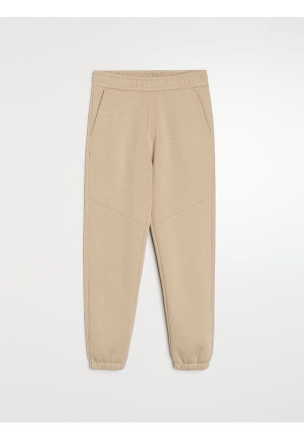 Sinsay - Spodnie dresowe regular fit - beżowy. Kolor: beżowy. Materiał: dresówka