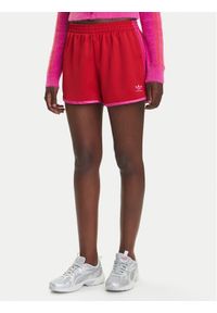 Adidas - adidas Szorty sportowe adicolor 3-Stripes Sprinter JZ3513 Czerwony Loose Fit. Kolor: czerwony. Materiał: syntetyk
