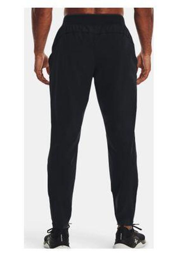 Spodnie dresowe męskie Under Armour STORM RUN PANT. Kolor: czarny. Materiał: dresówka. Sport: bieganie