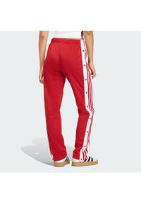 Adidas - adidas Spodnie dresowe Adibreak KD6324 Czerwony Loose Fit. Kolor: czerwony. Materiał: syntetyk #2