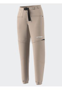 Adidas - adidas Spodnie dresowe Terrex Utilitas Hiking Zip-Off Tracksuit Bottoms HZ9046 Beżowy Regular Fit. Kolor: beżowy. Materiał: syntetyk #9