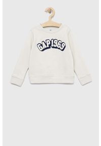 GAP bluza dziecięca kolor beżowy wzorzysta. Okazja: na co dzień. Kolor: beżowy. Materiał: poliester, dzianina. Styl: casual