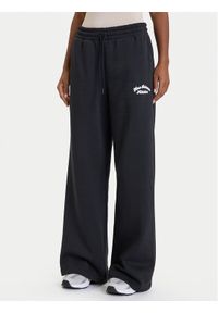 New Balance Spodnie dresowe WP53902 Czarny Relaxed Fit. Kolor: czarny. Materiał: bawełna