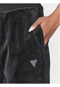 Guess Spodnie dresowe V3BB27 KBXI2 Czarny Regular Fit. Kolor: czarny. Materiał: syntetyk #5