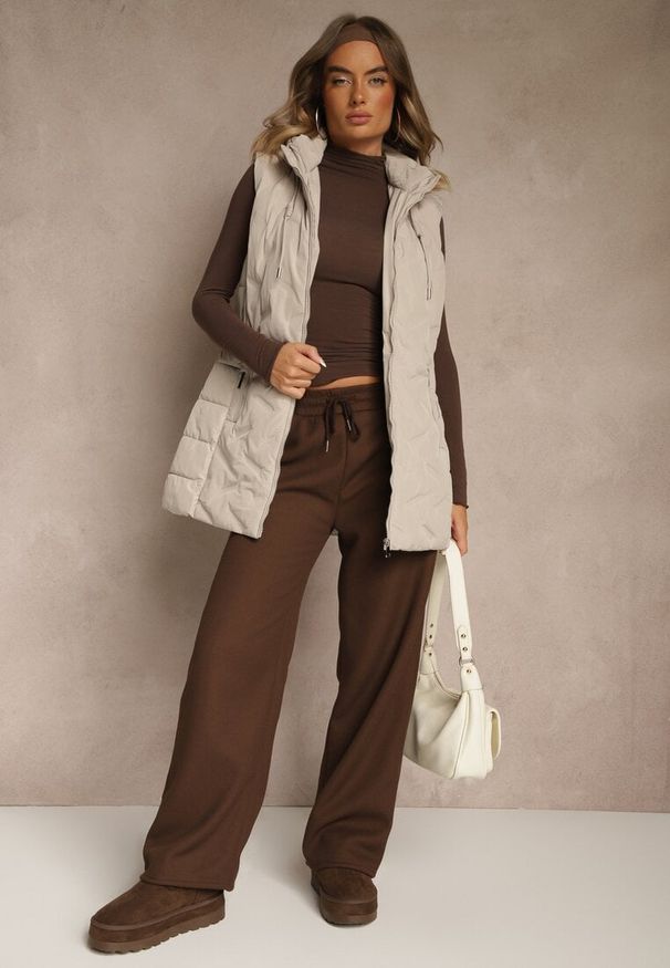 Renee - Ciemnobeżowa Taliowana Kamizelka Przejściowa z Kapturem Olepia. Okazja: na co dzień. Typ kołnierza: kaptur. Kolor: beżowy. Materiał: poliester, jeans. Sezon: jesień, wiosna. Styl: klasyczny, casual