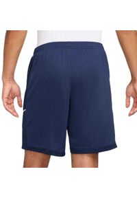 Nike - Męskie Spodenki Academy 25 DriFIT. Kolor: niebieski. Sport: turystyka piesza
