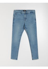 Sinsay - Jeansy chino slim fit - niebieski. Kolor: niebieski. Materiał: jeans