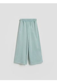 Reserved - Luźne spodnie dresowe - miętowy. Kolor: miętowy. Materiał: dresówka