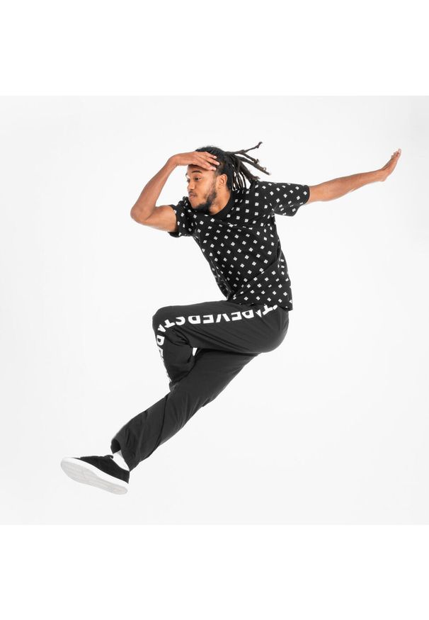 STAREVER - Koszulka z krótkim rękawem do tańca urban dance unisex Starever. Kolor: czarny. Materiał: bawełna, elastan, poliester, materiał. Długość rękawa: krótki rękaw. Długość: krótkie. Sport: taniec
