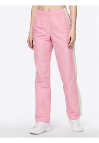 Asics Spodnie dresowe Tiger 2032C687 Różowy Relaxed Fit. Kolor: różowy. Materiał: syntetyk #1