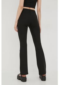 Tommy Jeans spodnie damskie kolor czarny dzwony high waist. Stan: podwyższony. Kolor: czarny. Materiał: poliester. Wzór: aplikacja #2