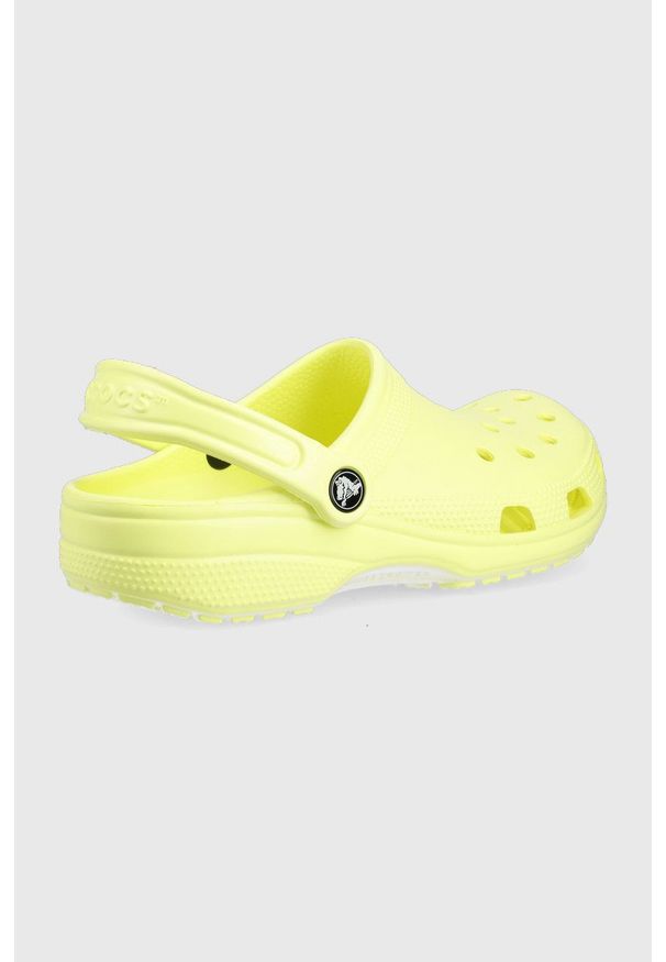 Crocs klapki damskie kolor żółty. Kolor: żółty. Materiał: materiał. Wzór: gładki. Obcas: na obcasie. Wysokość obcasa: niski