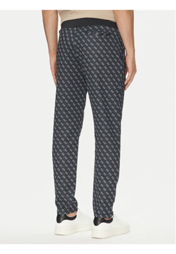 Guess Spodnie dresowe Korbin Z2BB05 FL04Q Czarny Regular Fit. Kolor: czarny. Materiał: syntetyk, bawełna