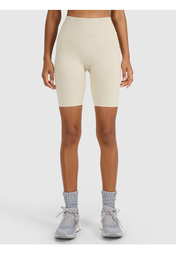 4f - 4F Legginsy kolarki treningowe bezszwowe damskie - beżowe XS/S. Stan: podwyższony. Kolor: beżowy. Materiał: materiał, elastan, syntetyk, dzianina, włókno. Długość: krótkie. Wzór: gładki. Sport: fitness