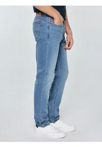 Big-Star - Jeansy męskie z przetarciami niebieskie Terry Carrot 133. Okazja: na co dzień. Stan: obniżony. Kolor: niebieski. Styl: casual #4