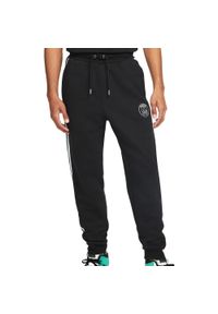 Spodnie sportowe męskie Nike Psg Jordan. Kolor: czarny. Materiał: dresówka