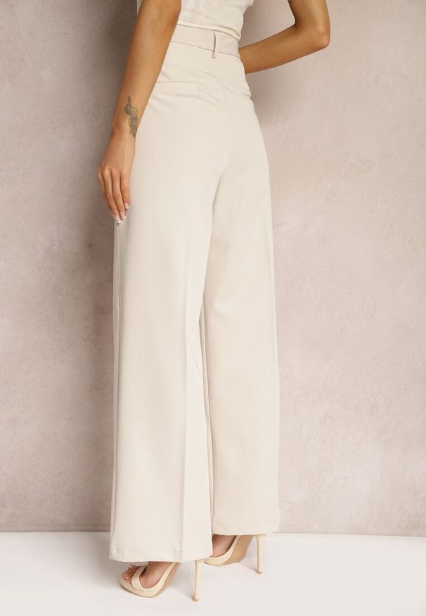 Renee - Jasnobeżowe Szerokie Spodnie High Waist Seraphella. Stan: podwyższony. Kolor: beżowy