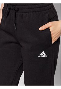 Adidas - adidas Spodnie dresowe Essentials Fleece GM5547 Czarny Regular Fit. Kolor: czarny. Materiał: bawełna, syntetyk #2