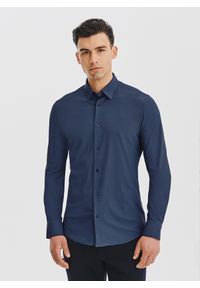 Pako Lorente - PAKO LORENTE – Granatowa dzianinowa koszula w jodełkę. Typ kołnierza: kołnierzyk klasyczny. Kolor: niebieski. Materiał: dzianina. Długość rękawa: długi rękaw. Długość: długie. Wzór: jodełka. Styl: klasyczny #1