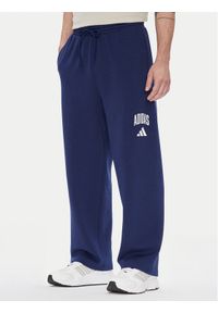 Adidas - adidas Spodnie dresowe Collegiate JM9179 Niebieski Regular Fit. Kolor: niebieski. Materiał: syntetyk, bawełna #1