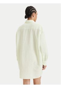 Tommy Jeans Sukienka koszulowa DW0DW22344 Zielony jasny Relaxed Fit. Kolor: zielony. Materiał: len. Typ sukienki: koszulowe #4
