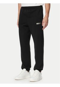 Calvin Klein Spodnie dresowe LV04LG212G Czarny Regular Fit. Kolor: czarny. Materiał: bawełna #1
