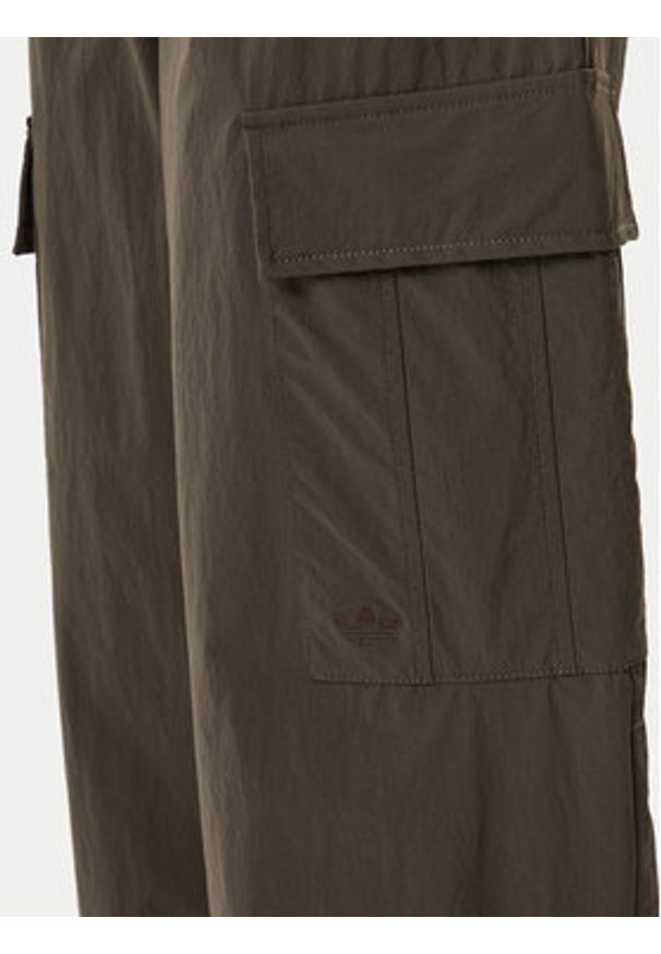 Adidas - adidas Spodnie materiałowe Premium Essentials JD4785 Khaki Loose Fit. Kolor: brązowy. Materiał: syntetyk