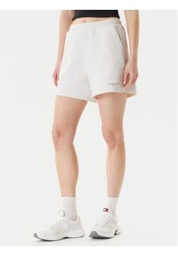 Tommy Jeans Szorty sportowe Linear DW0DW21152 Écru Relaxed Fit. Materiał: bawełna