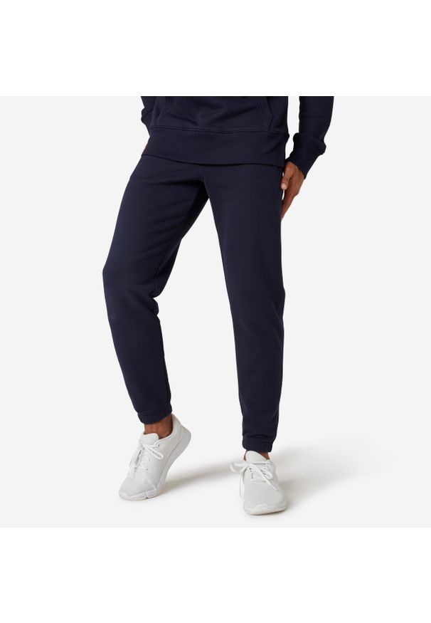 DOMYOS - Spodnie dresowe męskie Domyos Gym & Pilates. Kolor: niebieski. Materiał: poliester, bawełna, materiał, elastan. Sport: joga i pilates