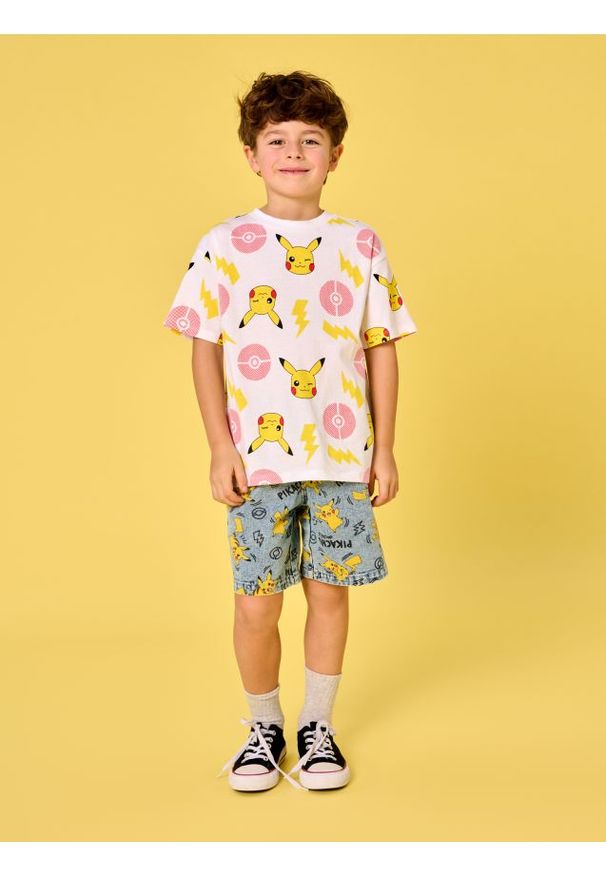 Sinsay - Koszulka z nadrukiem Pokémon - kremowy. Kolor: kremowy. Materiał: bawełna. Długość rękawa: krótki rękaw. Długość: krótkie. Wzór: nadruk