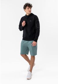 Volcano - Klasyczne szorty dresowe M-MERO. Okazja: na co dzień. Kolor: niebieski. Materiał: dresówka. Długość: krótkie. Styl: klasyczny #1