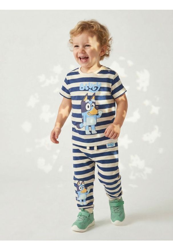 Sinsay - Spodnie Bluey - kremowy. Kolor: kremowy