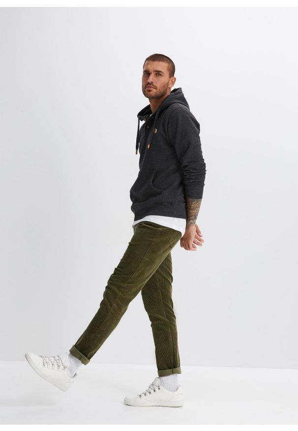 bonprix - Bluza z kapturem z detalami z imitacji skóry z miękko szorstkowaną stroną wewnętrzną. Typ kołnierza: kaptur. Kolor: czarny. Materiał: skóra. Styl: sportowy