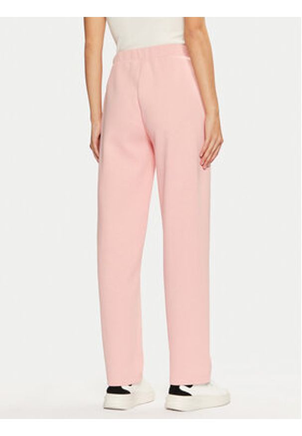 Guess Spodnie materiałowe V5RB01 KCLD1 Różowy Regular Fit. Kolor: różowy. Materiał: syntetyk, bawełna