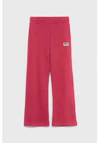 Fila spodnie dresowe dziecięce kolor różowy gładkie. Stan: podwyższony. Kolor: różowy. Materiał: dresówka. Wzór: gładki