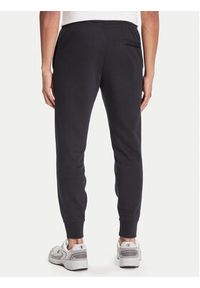 Nike Spodnie dresowe Club Fleece FN3801 Czarny Regular Fit. Kolor: czarny. Materiał: bawełna #4