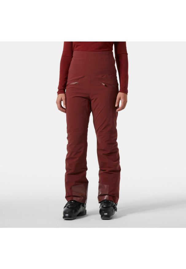 Spodnie narciarskie dla kobiet Helly Hansen Alphelia Hi Waist. Kolor: czerwony. Sezon: zima. Sport: narciarstwo