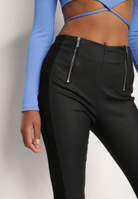 Renee - Czarne Spodnie Skinny Panousa. Stan: podwyższony. Kolor: czarny. Materiał: materiał. Styl: sportowy